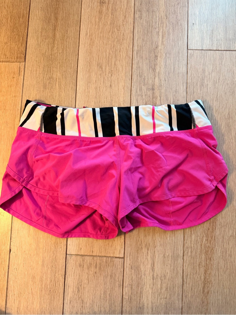 lululemon athletica Hot Pink Running Shorts with Black & White Striped Waistband